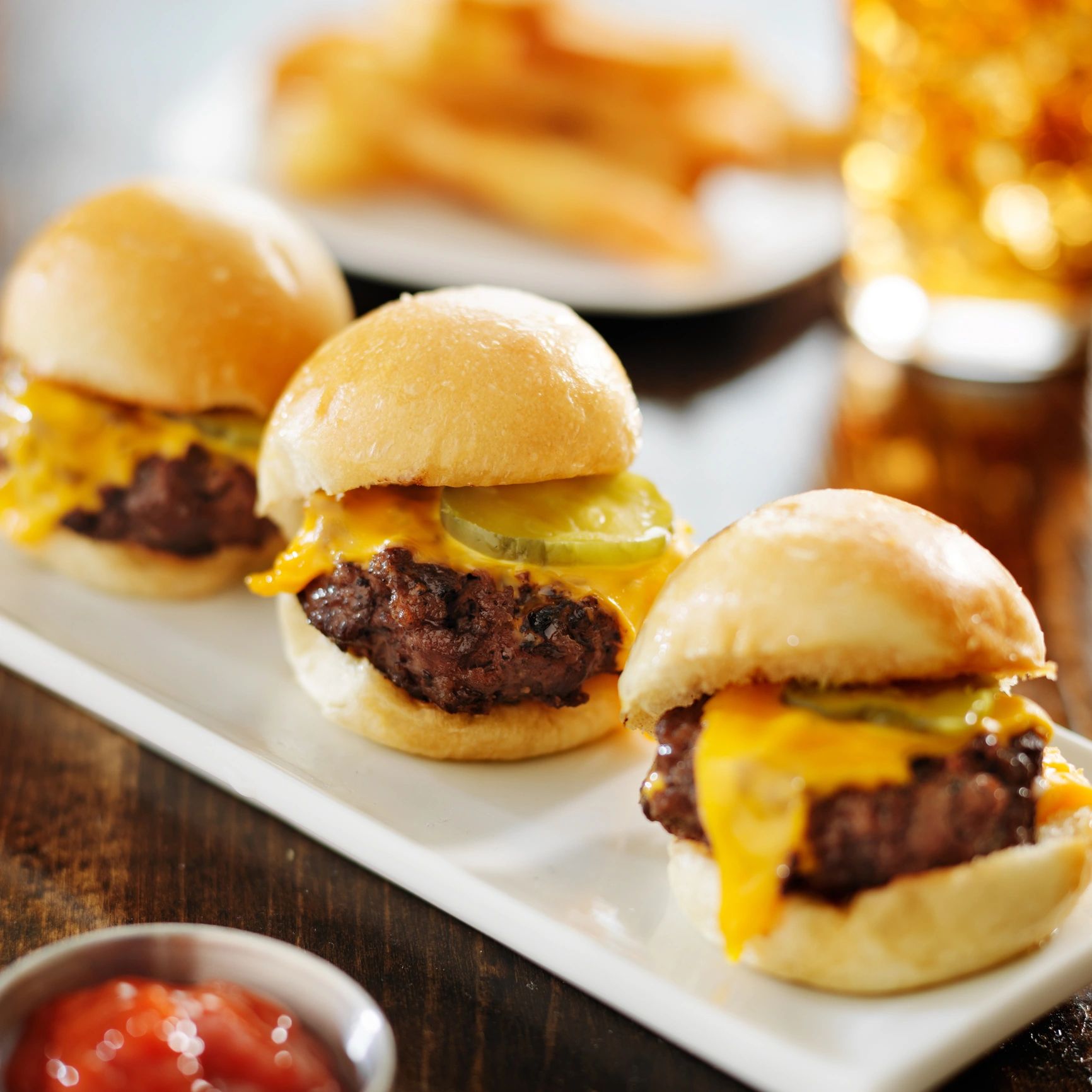 Burger sliders with melted cheese and pickles
